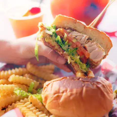 Mahi sandwich served with crinkle-cut fries